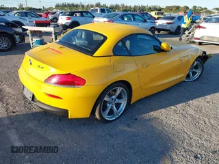 2011 BMW Z4 sDrive30i with VIN WBALM5C56BE495894, listed as a IAAI auction lot 41749017 with 38,987 mi miles. Bid and sale history available at carsss.com. Image 4.