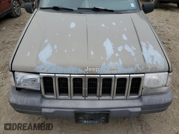 1996 Jeep Grand Cherokee Laredo with VIN 1J4GZ58S7TC403946, listed as a Copart auction lot 71785734 with 231,780 mi miles and Salvage Title. Bid and sale history available at carsss.com. Image 11.