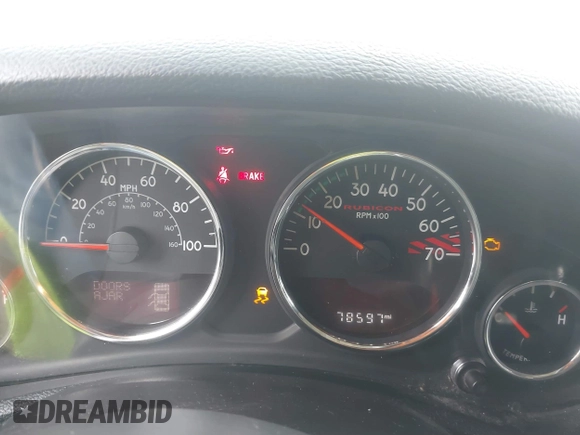 2015 Jeep Wrangler Unlimited Rubicon Hard Rock with VIN 1C4HJWFG9FL569962, listed as a IAAI auction lot 41557801 with 78,597 mi miles and . Bid and sale history available at DreamBid. Image 7.