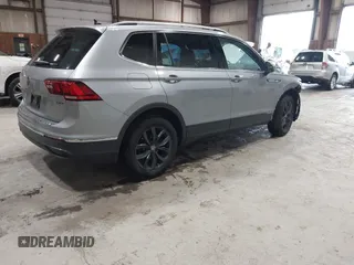 2024 Volkswagen Tiguan SE with VIN 3VVMB7AX8RM084483, listed as a IAAI auction lot 42452619 with 14,618 mi miles and . Bid and sale history available at DreamBid. Image 4.