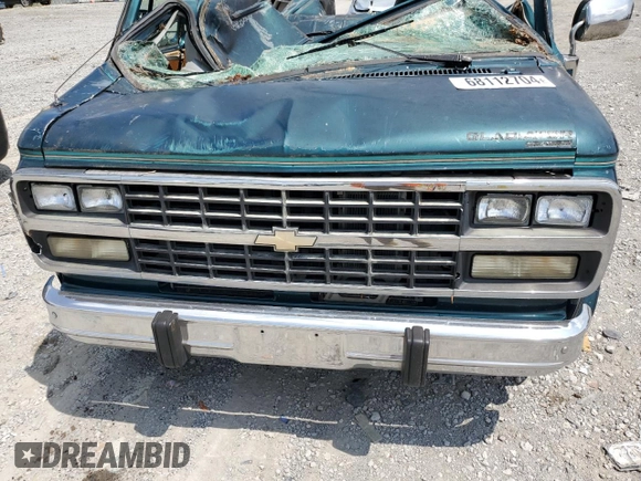 1995 Chevrolet Chevy Van z VIN 1GBEG25K7SF103122, wystawiony jako Copart lot #68112704 z przebiegiem Nie podano mil oraz Szkody całkowita. Historia ofert i sprzedaży dostępna na DreamBid. Obrazek 12.