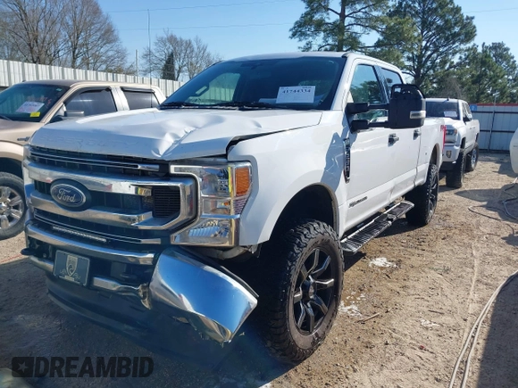 2021 Ford Super Duty F-250 SRW XL with VIN 1FT7W2BT0MED05328, listed as a IAAI auction lot 41744334 with 106,867 mi miles. Bid and sale history available at carsss.com. Image 2.