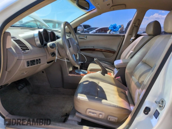2004 Nissan Maxima SE with VIN 1N4BA41E24C883438, listed as a Copart auction lot 56175265 with 122,747 mi miles and Salvage title. Bid and sale history available at DreamBid. Image 7.