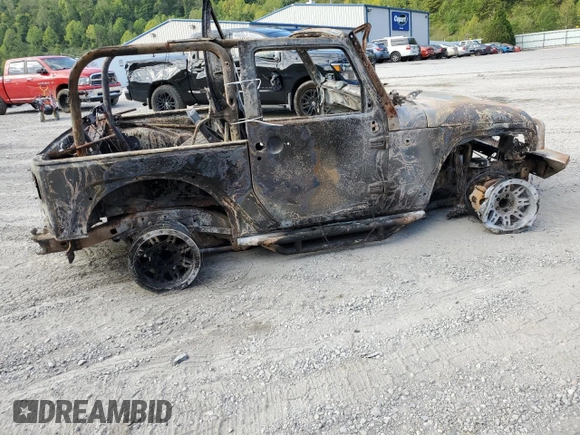 2010 Jeep Wrangler Rubicon with VIN 1J4BA6D17AL142030, listed as a Copart auction lot 76620274 with Not provided miles and Clean title. Bid and sale history available at DreamBid. Image 3.
