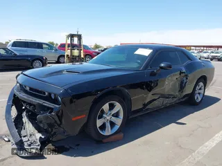 2019 Dodge Challenger SXT z VIN 2C3CDZAG1KH587281, wystawiony jako IAAI lot #42180057 z przebiegiem 109 333 mil mil oraz . Historia ofert i sprzedaży dostępna na DreamBid. Obrazek 6.