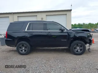 2016 Chevrolet Tahoe LT z VIN 1GNSKBKC6GR210329, wystawiony jako IAAI lot #42126175 z przebiegiem 190 207 mil mil oraz . Historia ofert i sprzedaży dostępna na DreamBid. Obrazek 12.