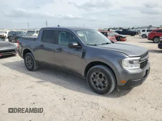 2023 Ford Maverick XL with VIN 3FTTW8E98PRA53671, listed as a Copart auction lot 54009765 with 54,049 mi miles and Salvage Title. Bid and sale history available at DreamBid. Image 4.