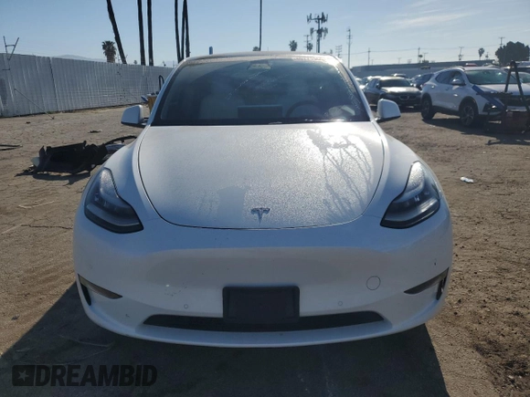 2022 Tesla Model Y Long Range with VIN 7SAYGDEE1NF339663, listed as a Copart auction lot 49771965 with 33,734 mi miles and Salvage Title. Bid and sale history available at carsss.com. Image 5.