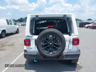 2024 Jeep Wrangler Sahara with VIN 1C4RJXP64RW270463, listed as a IAAI auction lot 42598295 with 36,251 mi miles and . Bid and sale history available at DreamBid. Image 16.