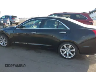 2014 Cadillac ATS Standard RWD with VIN 1G6AA5RA7E0100973, listed as a IAAI auction lot 41795657 with 93,807 mi miles and . Bid and sale history available at DreamBid. Image 14.