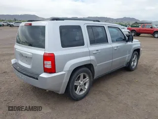 2010 Jeep Patriot Sport with VIN 1J4NT2GB7AD529286, listed as a IAAI auction lot 42020227 with 158,401 mi miles. Bid and sale history available at carsss.com. Image 4.
