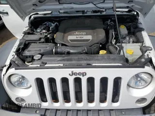 2017 Jeep Wrangler Sport z VIN 1C4AJWAG1HL556988, wystawiony jako Copart lot #52613315 z przebiegiem 60 955 mil mil oraz Szkoda całkowita • Salvage title. Historia ofert i sprzedaży dostępna na DreamBid. Obrazek 11.