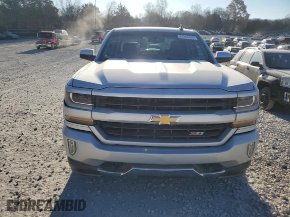 2017 Chevrolet Silverado 1500 LT with VIN 1GCUKREC0HF212120, listed as a Copart auction lot 83384734 with 119,078 mi miles and Salvage Title. Bid and sale history available at DreamBid. Image 5.