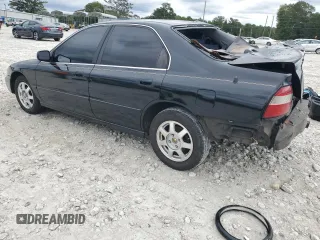 1994 Honda Accord EX with VIN JHMCD5651RC076614, listed as a Copart auction lot 70461954 with 494,000 mi miles and Salvage Title. Bid and sale history available at carsss.com. Image 2.