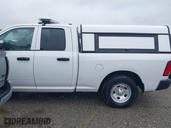 2023 Ram 1500 Tradesman with VIN 1C6RR7FT4PS588854, listed as a IAAI auction lot 42114085 with 24,403 mi miles and . Bid and sale history available at DreamBid. Image 14.