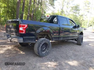 2018 Ford F-150 XL with VIN 1FTFW1EG2JFB91486, listed as a IAAI auction lot 42302383 with 66,043 mi miles and . Bid and sale history available at DreamBid. Image 4.