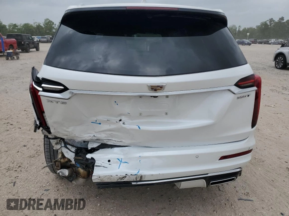 2024 Cadillac XT6 FWD Luxury with VIN 1GYKPAR47RZ720446, listed as a Copart auction lot 51762695 with 10,728 mi miles and Salvage Title. Bid and sale history available at carsss.com. Image 6.