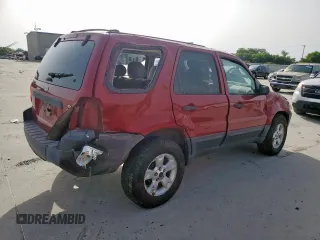 2006 Ford Escape XLT with VIN 1FMYU03136KD25536, listed as a Copart auction lot 56892805 with 187,216 mi miles and Salvage title. Bid and sale history available at DreamBid. Image 3.