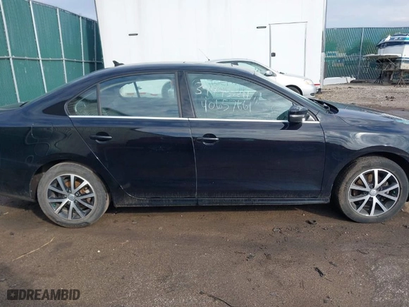 2018 Volkswagen Jetta 1.4T SE with VIN 3VWDB7AJ8JM240887, listed as a IAAI auction lot 40657661 with 76,568 mi miles. Bid and sale history available at carsss.com. Image 13.