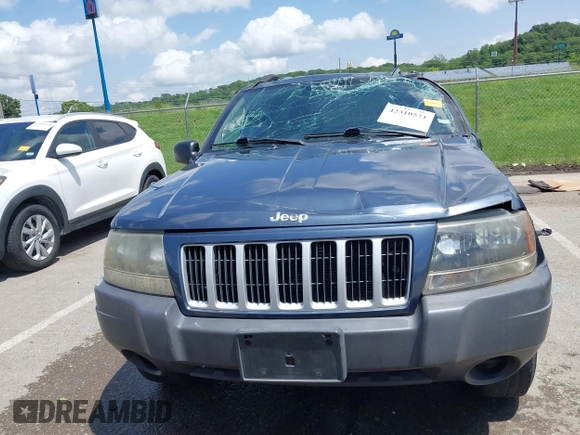 2004 Jeep Grand Cherokee Laredo with VIN 1J4GX48S44C205469, listed as a IAAI auction lot 42310571 with 154,929 mi miles and . Bid and sale history available at DreamBid. Image 12.