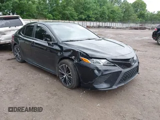 2019 Toyota Camry LE z VIN 4T1B11HK0KU739121, wystawiony jako IAAI lot #42372066 z przebiegiem 95 576 mil mil oraz . Historia ofert i sprzedaży dostępna na DreamBid. Obrazek 1.