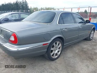 2004 Jaguar XJ with VIN SAJEA74C94SG10199, listed as a IAAI auction lot 42007186 with 138,807 mi miles and . Bid and sale history available at DreamBid. Image 6.