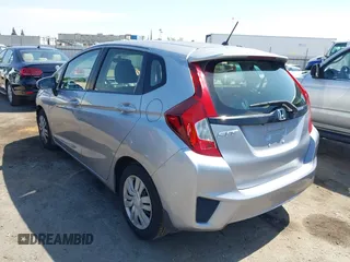 2017 Honda Fit LX with VIN JHMGK5H51HS023212, listed as a IAAI auction lot 42153107 with 106,778 mi miles. Bid and sale history available at carsss.com. Image 3.