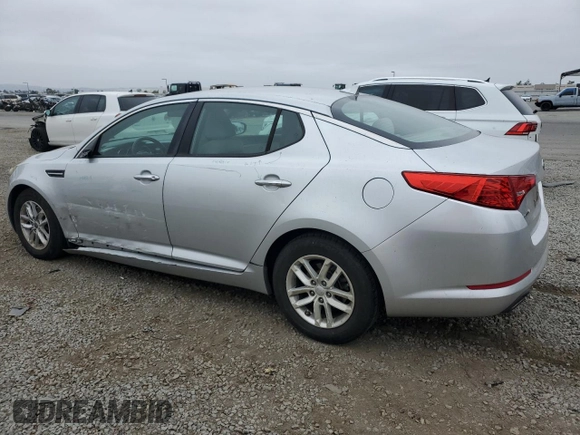 2012 Kia Optima LX z VIN 5XXGM4A73CG033597, wystawiony jako Copart lot #59585515 z przebiegiem 141 577 mil mil oraz Szkoda całkowita • Salvage title. Historia ofert i sprzedaży dostępna na DreamBid. Obrazek 2.