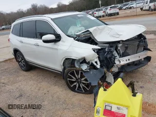 2019 Honda Pilot Touring 8-Passenger with VIN 5FNYF5H99KB009432, listed as a IAAI auction lot 41756915 with Not Provided miles. Bid and sale history available at carsss.com. Image 1.