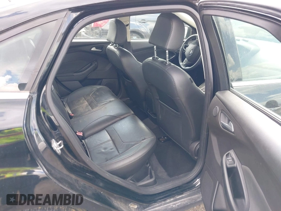 2016 Ford Focus Titanium z VIN 1FADP3J27GL215436, wystawiony jako IAAI lot #42709166 z przebiegiem 75 956 mil mil oraz . Historia ofert i sprzedaży dostępna na DreamBid. Obrazek 8.