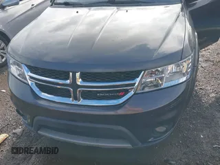 2014 Dodge Journey SXT with VIN 3C4PDCBB3ET172374, listed as a IAAI auction lot 42188228 with 138,129 mi miles. Bid and sale history available at carsss.com. Image 6.