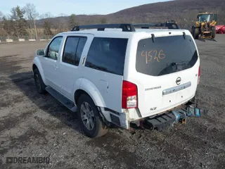 2010 Nissan Pathfinder SE with VIN 5N1AR1NB9AC606094, listed as a IAAI auction lot 41384526 with 217,202 mi miles. Bid and sale history available at carsss.com. Image 3.