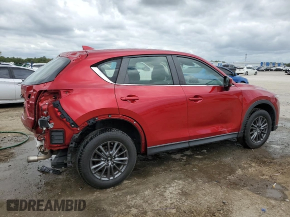 2019 Mazda CX-5 Sport with VIN JM3KFABM5K1597891, listed as a Copart auction lot 55020815 with 100,454 mi miles and Non Repairable. Bid and sale history available at DreamBid. Image 3.