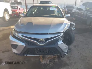 2018 Toyota Camry LE with VIN 4T1B11HK9JU068675, listed as a IAAI auction lot 41299139 with 144,675 mi miles. Bid and sale history available at carsss.com. Image 16.
