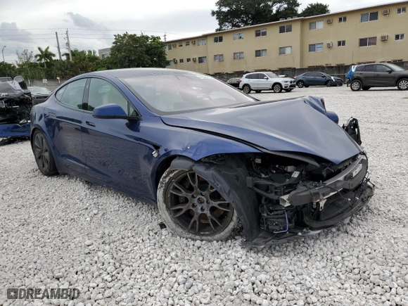 2023 Tesla Model S with VIN 5YJSA1E58PF498685, listed as a Copart auction lot 41690475 with 0 mi miles and Salvage Title. Bid and sale history available at carsss.com. Image 4.