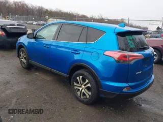 2016 Toyota RAV4 LE with VIN JTMBFREV9GJ100635, listed as a IAAI auction lot 41858669 with 171,644 mi miles. Bid and sale history available at carsss.com. Image 3.