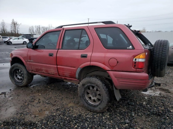 1998 Isuzu Rodeo S with VIN 4S2CM58W5W4350575, listed as a Copart auction lot 84537714 with 215,573 mi miles and Salvage Title. Bid and sale history available at carsss.com. Image 2.