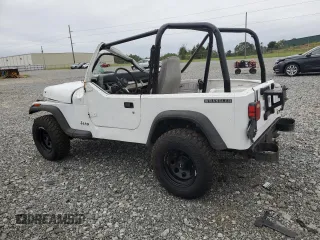 1990 Jeep Wrangler "S" with VIN 2J4FY19E6LJ528040, listed as a Copart auction lot 70989084 with 176,416 mi miles and Salvage Title. Bid and sale history available at carsss.com. Image 2.