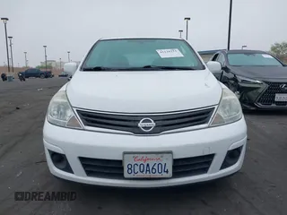 2010 Nissan Versa 1.8 SL with VIN 3N1BC1CP2AL457222, listed as a IAAI auction lot 42128211 with 194,450 mi miles. Bid and sale history available at carsss.com. Image 14.