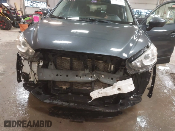2013 Mazda CX-5 Touring with VIN JM3KE4CE4D0157892, listed as a IAAI auction lot 41684348 with 146,496 mi miles and . Bid and sale history available at DreamBid. Image 6.