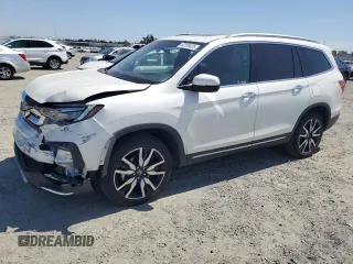 2019 Honda Pilot Touring 8-Passenger with VIN 5FNYF6H96KB057122, listed as a Copart auction lot 52258425 with 46,712 mi miles and Salvage title. Bid and sale history available at DreamBid. Image 1.