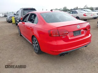 2014 Volkswagen Jetta GLI with VIN 3VW4T7AJ2EM246347, listed as a IAAI auction lot 42553341 with 140,793 mi miles and . Bid and sale history available at DreamBid. Image 3.