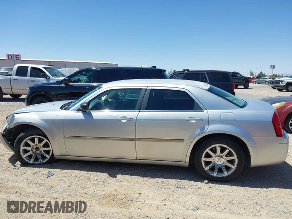 2007 Chrysler 300 with VIN 2C3KA43RX7H664582, listed as a IAAI auction lot 42106297 with 141,866 mi miles and . Bid and sale history available at DreamBid. Image 14.