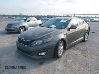 2014 Kia Optima LX with VIN 5XXGM4A73EG300966, listed as a IAAI auction lot 42048798 with 110,478 mi miles. Bid and sale history available at carsss.com. Image 2.