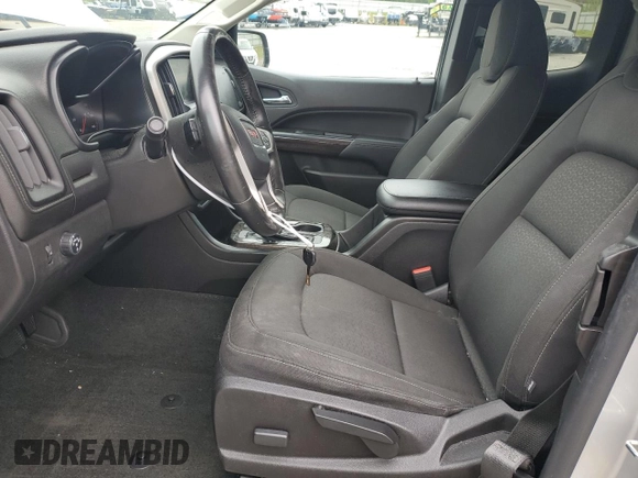 2016 GMC Canyon z VIN 1GTH5CE3XG1372815, wystawiony jako Copart lot #55076495 z przebiegiem 123 485 mil mil oraz Szkoda całkowita • Salvage title. Historia ofert i sprzedaży dostępna na DreamBid. Obrazek 7.