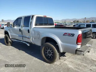 2003 Ford F-250 XL with VIN 1FTNW21S63EC36496, listed as a Copart auction lot 88551695 with 256,668 mi miles and Salvage title. Bid and sale history available at DreamBid. Image 2.