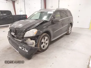 2011 Mercedes-Benz GL-Class GL 450 with VIN 4JGBF7BE2BA737203, listed as a IAAI auction lot 41364607 with 133,921 mi miles. Bid and sale history available at carsss.com. Image 2.