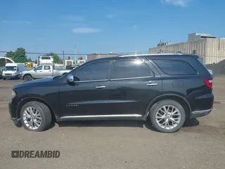 2014 Dodge Durango Citadel with VIN 1C4RDJEG0EC537335, listed as a IAAI auction lot 42660446 with 176,791 mi miles and . Bid and sale history available at DreamBid. Image 14.