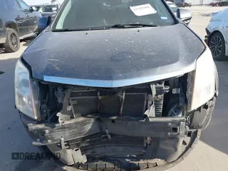 2012 Cadillac SRX Luxury Collection with VIN 3GYFNAE37CS640833, listed as a IAAI auction lot 41745208 with 153,711 mi miles and . Bid and sale history available at carsss.com. Image 6.