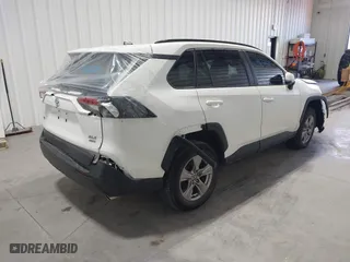 2022 Toyota RAV4 XLE with VIN 2T3P1RFV8NW286279, listed as a IAAI auction lot 41672654 with 56,984 mi miles. Bid and sale history available at carsss.com. Image 4.